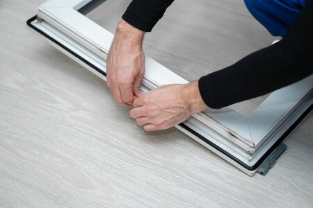 Professional master at repair and installation of windows, changes rubber seal gasket in pvc...
