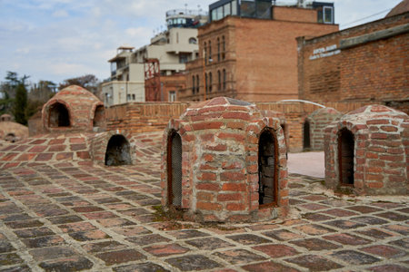 Popular city landmark in Tbilisi. Ancient underground complex of sulfur baths.の写真素材