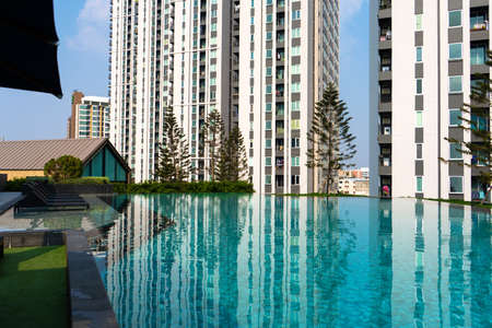 Recreation area with swimming pool in a modern condominium residential complex. Samui, Tailand -...