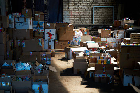 Boxes with humanitarian aid for Ukraine in volunteer center warehouse. Dnipro, Ukraine - 07.06.2022のeditorial素材