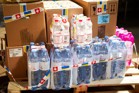 Boxes with humanitarian aid for Ukraine in volunteer center warehouse. Dnipro, Ukraine - 07.06.2022のeditorial素材