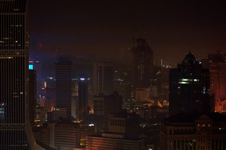 A nighttime cityscape. Night time illumination of a big city panorama. Top view from the drone. Kuala Lumpur, Malaysia - 05.22.2020のeditorial素材