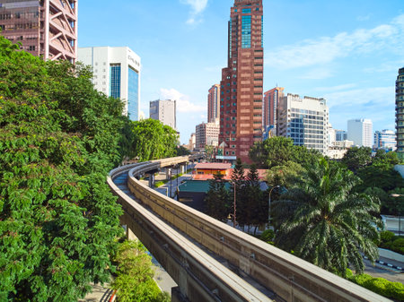 Elevated monorail through a modern metropolis. Kuala Lumpur, Malaysia - 02/05/2020のeditorial素材