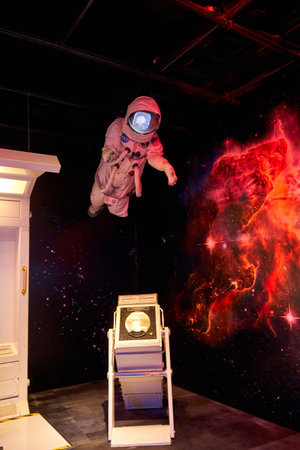 Funny astronaut space suit where you can put your photo in. Museum of space and astronautics. Kuala...