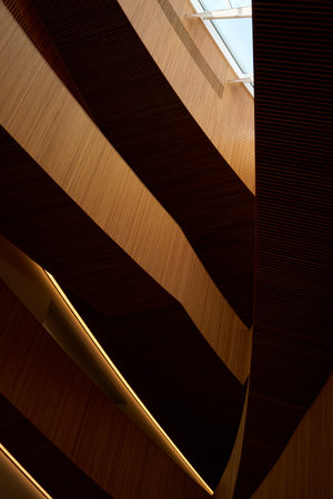 Design of the central public library in Calgary. Modern art interior design with wooden walls and...
