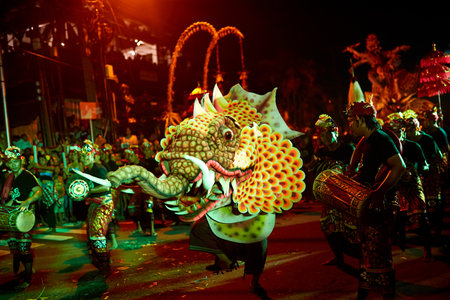 The sacred traditional Ogoh-Ogoh masquerade parade with dancing and scary figures begins before the Nyepi holiday on the popular tourist island of Bali. Bali, Indonesia - 03.16.2018のeditorial素材