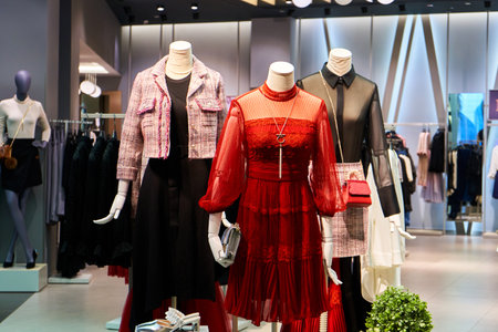A showcase with mannequins in a clothing store in a shopping centerの写真素材