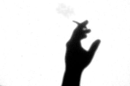 Emotion and abstract, black and white, hand and wall - smokerの写真素材