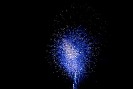 Lighting and firework on black night sky