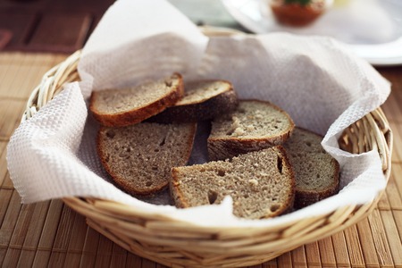  Tasty slices of bread in a wicker basketの写真素材