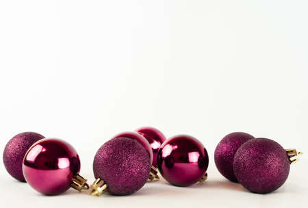 Bright crimson Christmas balls on a white background. High quality photoの写真素材