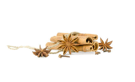Cinnamon, star anise and cloves isolated on a white background. High quality photo
