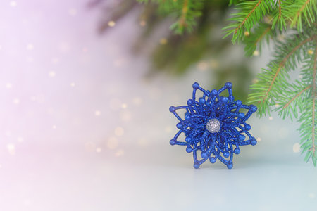 Christmas toy on the background of a fir tree. New Years background. High quality photoの写真素材