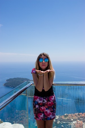 Girl in Dubornik Croatia Mountains and Seaの写真素材