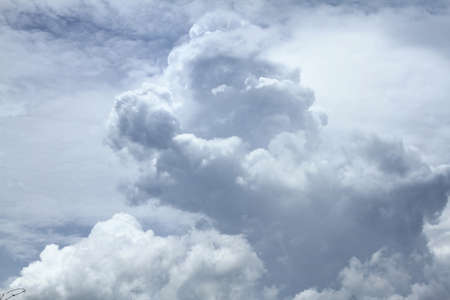 White clouds float in the blue sky.の写真素材