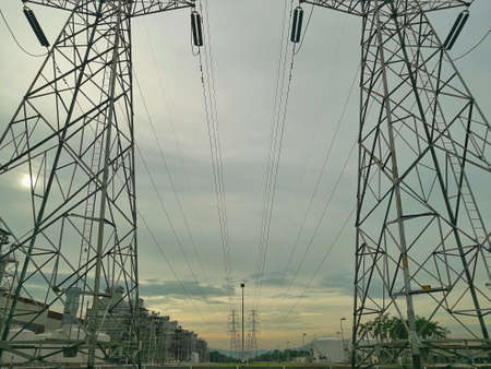 Electric pole Stand on the ground have the sky and cloud is a background