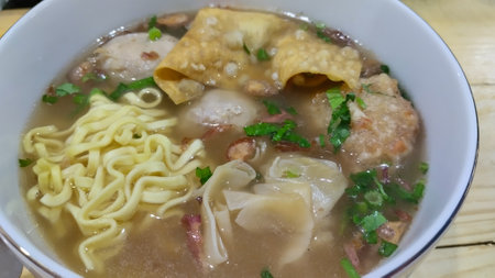 Vietnamese noodle soup with dumpling and pork ball