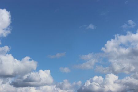 Beautiful Cumulus clouds in the blue sky during the day.