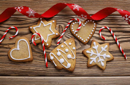 christmas cookies. decorative christmas gingerbreads on wooden backgroundの写真素材