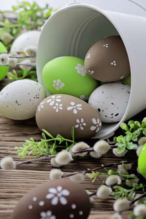 colorful easter eggs and spring flowers