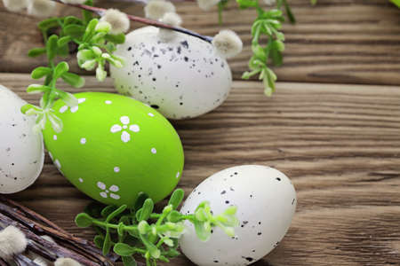 colorful easter eggs and spring flowers