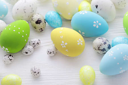 colorful easter eggs and spring flowers