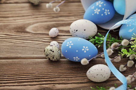 colorful easter eggs and spring flowersの写真素材