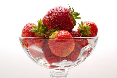Several strawberries in a glassの写真素材