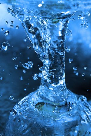 	Shot of water splashing and blue dropsの写真素材