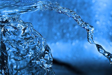 	Shot of water splashing and blue dropsの写真素材