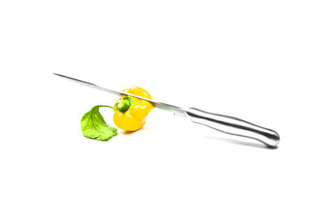 Yellow Sweet Pepper  with Knife Isolation の写真素材