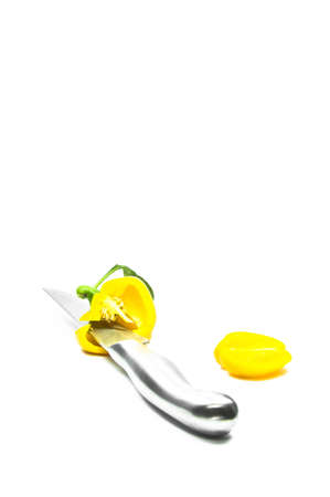 Yellow Sweet Pepper  with Knife Isolation 