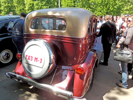 Back view of Soviet retro frontengine rearwheeldrive passenger car of 193040s sedan GAZ M1 Emkaのeditorial素材