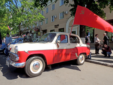 Soviet small family retro car of 1960s sedan Moskvitch 407 side view on the celebration of Victory VE Dayのeditorial素材