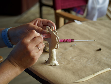 Making shapes from modeling clay in the hobby groupの写真素材