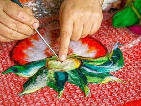 Creating a textile application with hands .