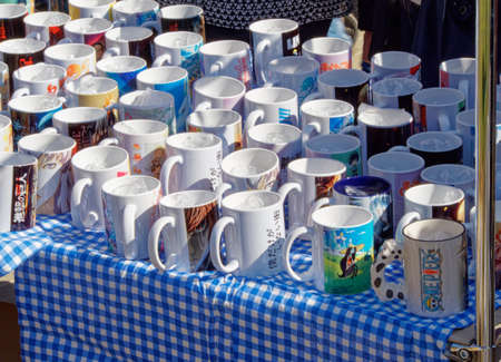 Voronezh, Russia - May 1, 2018: The table of street trade with souvenir large porcelain cups on the festival of Japanese animationのeditorial素材
