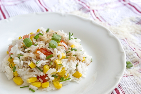 vegetable risotto - basmati rice with corns, tomatoes and onionの写真素材