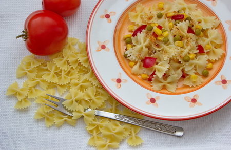 butterfly shaped pasta with vegetablesの写真素材