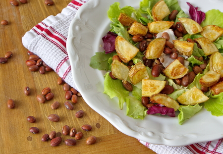 fresh salad with baked potatoes and leguminousの写真素材