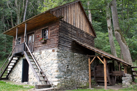 romanian traditional wooden house with mill, open-air museum, Branのeditorial素材