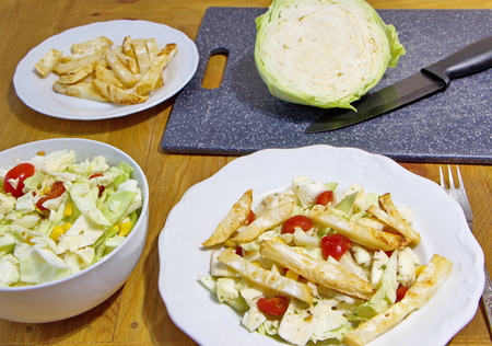 cabbage salad and celery chipsの写真素材
