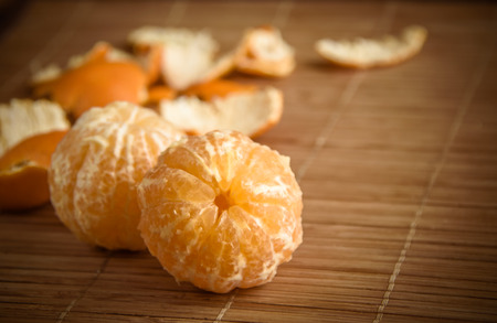 tangerines in snow on a wooden table, new year, a still lifeの写真素材