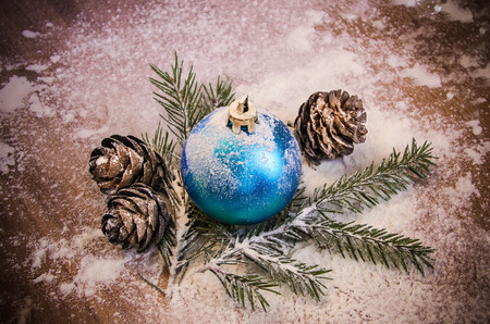 New Year's toys and bumps in the snow, Christmas backgroundの写真素材