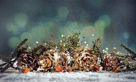 Christmas wooden background with snow fir tree.の写真素材