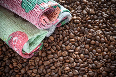 coffee grains on grunge wooden backgroundの写真素材