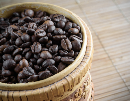 coffee grains on grunge wooden backgroundの写真素材