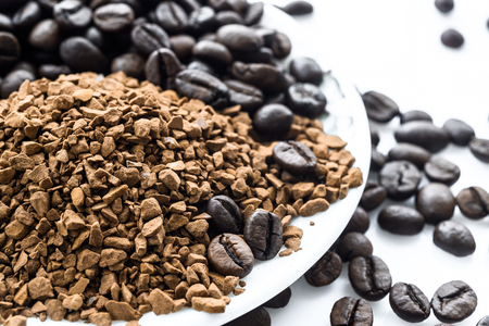 roasted coffee beans isolated in white background cutoutの写真素材