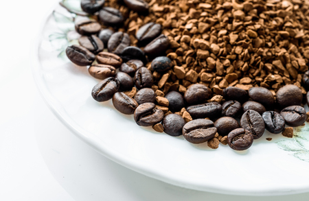 roasted coffee beans isolated in white background cutoutの写真素材