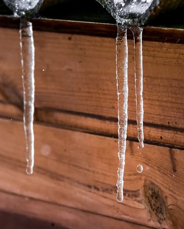 icicle on a roof also drip down, springの写真素材